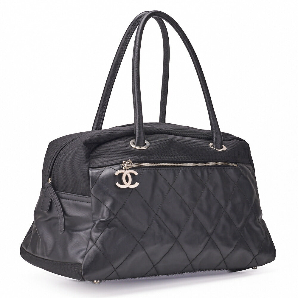 CHANEL Handbag Boston Bag Coated Canvas Coco Charm Black Silver-Tone Hardware Pre-Owned - Vintage La Charme