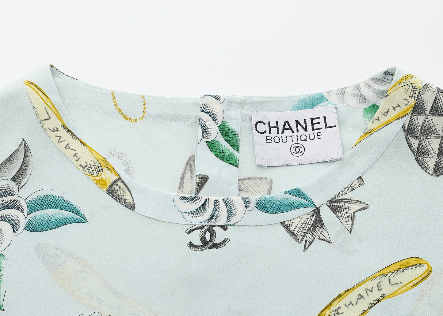 CHANEL T-Shirt Blouse Short Sleeve Ribbon Cut Sew Cotton Light Blue Gold-Tone Hardware Pre-Owned - Vintage La Charme