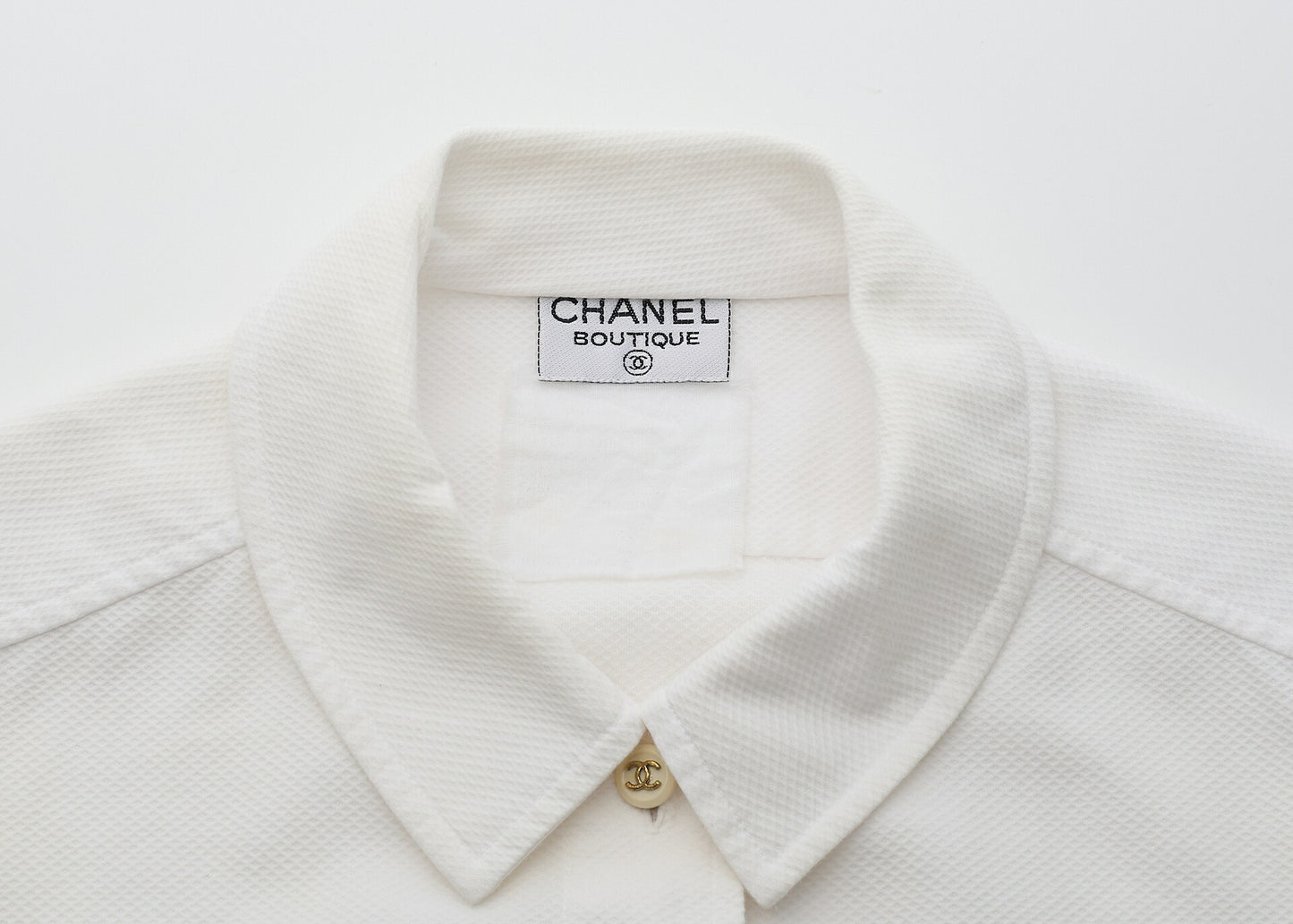 CHANEL Sleeveless Shirt, Collared, Cotton, White, Silver-Tone Hardware, Pre-Owned - Vintage La Charme