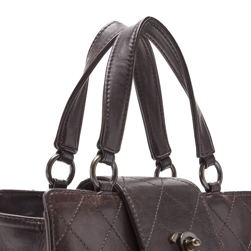 CHANEL Handbag Matelasse Lambskin Brown Gold-Tone Hardware Pre-Owned - Vintage La Charme