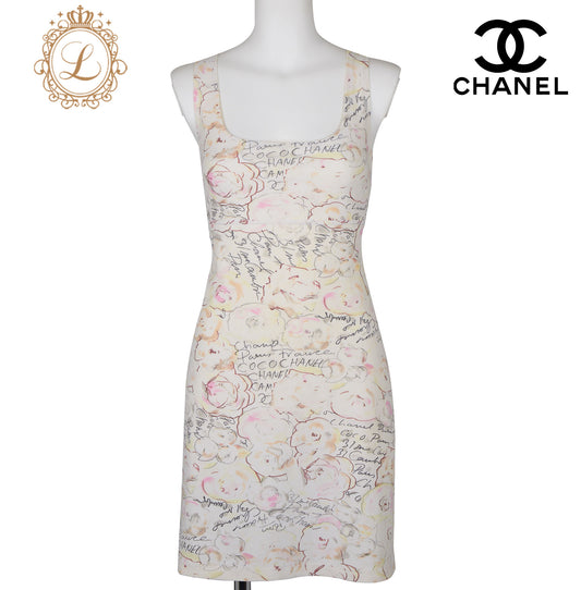 CHANEL Sleeveless Dress, Camellia Logo, Nylon Blend, Ivory, Silver-Tone Hardware, Pre-Owned - Vintage La Charme