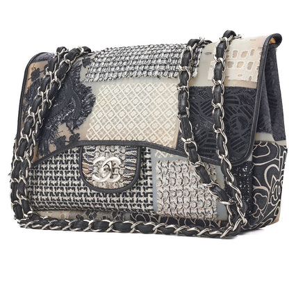 CHANEL Shoulder Bag Matelasse Coco Mark Patchwork Silicone Black Silver-Tone Hardware Pre-Owned - Vintage La Charme
