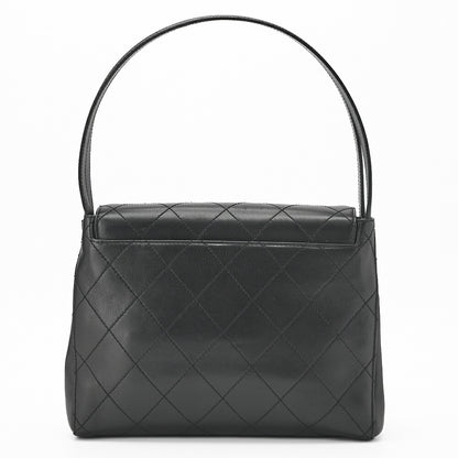 CHANEL Handbag Matelasse Turn Lock V Flap Calfskin Black Gold-Tone Hardware Pre-Owned - Vintage La Charme