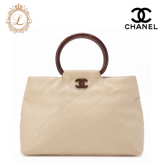 CHANEL Handbag Matelasse Coco Mark Wood Pattern Caviar Skin Beige Gold-Tone Hardware Pre-Owned - Vintage La Charme