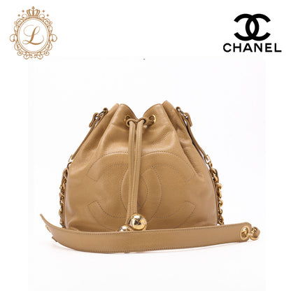 CHANEL Shoulder Bag Coco Mark Drawstring Ball Charm Caviar Leather Beige Gold-Tone Hardware Pre-Owned - Vintage La Charme