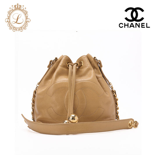 CHANEL Shoulder Bag Coco Mark Drawstring Ball Charm Caviar Leather Beige Gold-Tone Hardware Pre-Owned - Vintage La Charme