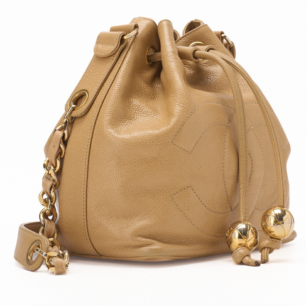 CHANEL Shoulder Bag Coco Mark Drawstring Ball Charm Caviar Leather Beige Gold-Tone Hardware Pre-Owned - Vintage La Charme