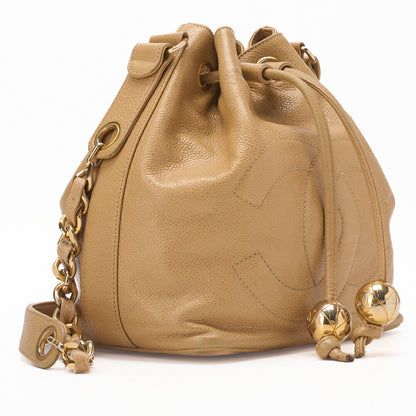 CHANEL Shoulder Bag Coco Mark Drawstring Ball Charm Caviar Leather Beige Gold-Tone Hardware Pre-Owned - Vintage La Charme