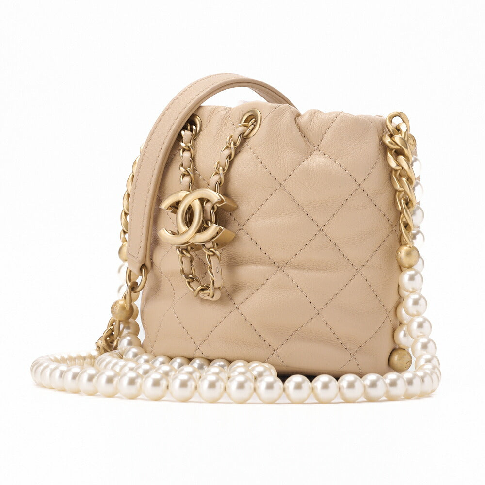CHANEL Shoulder Bag, Matelasse Pearl Drawstring Type, Lambskin, Beige, Gold-Tone Hardware, Pre-Owned - Vintage La Charme