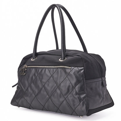 CHANEL Handbag Boston Bag Coated Canvas Coco Charm Black Silver-Tone Hardware Pre-Owned - Vintage La Charme