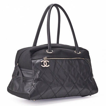 CHANEL Handbag Boston Bag Coated Canvas Coco Charm Black Silver-Tone Hardware Pre-Owned - Vintage La Charme