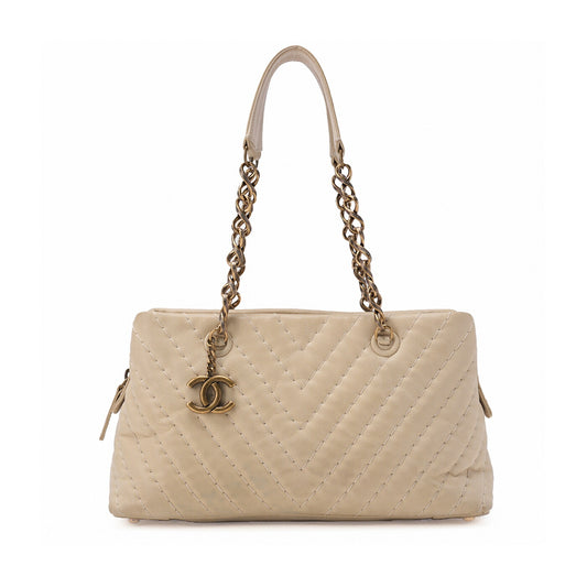 CHANEL V-Stitch Chain Shoulder Bag Sparkle Leather Ivory with Coco Charm Gold-Tone Hardware, Pre-Owned