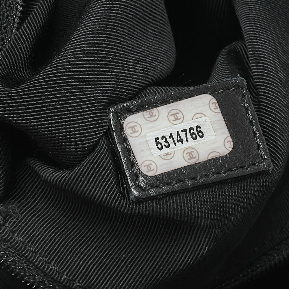 CHANEL Coco Mark Tortoiseshell Plate Backpack Lambskin Black Silver-Tone Hardware, Pre-Owned