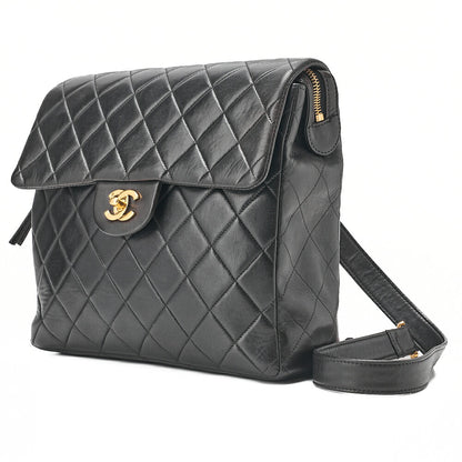 CHANEL Lambskin Matelasse Turn Lock Chain Backpack Black Gold-Tone Hardware, Pre-Owned