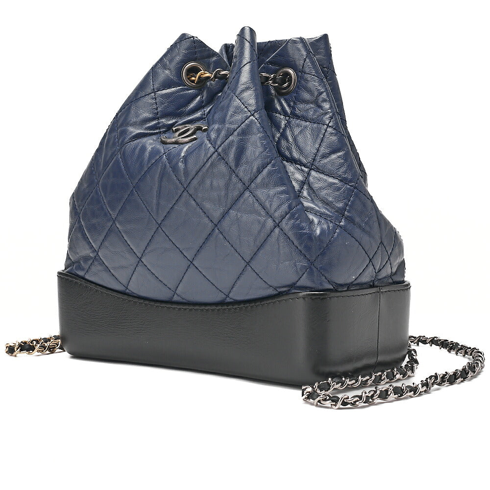 CHANEL Vintage Calf Gabrielle de Chanel Drawstring Chain Backpack Navy x Black Gold x Silver-Tone Hardware, Pre-Owned