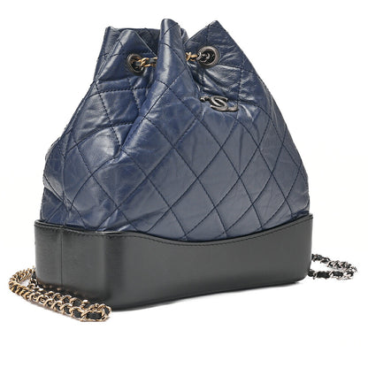 CHANEL Vintage Calf Gabrielle de Chanel Drawstring Chain Backpack Navy x Black Gold x Silver-Tone Hardware, Pre-Owned