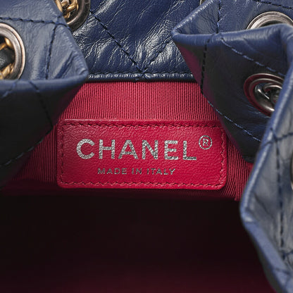 CHANEL Vintage Calf Gabrielle de Chanel Drawstring Chain Backpack Navy x Black Gold x Silver-Tone Hardware, Pre-Owned