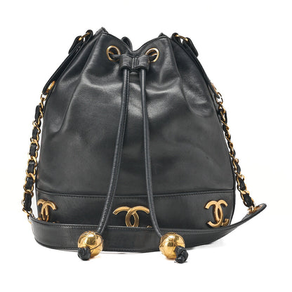 CHANEL Chain Shoulder Bag Triple Coco Lambskin Ball Charm Drawstring Black Gold-Tone Hardware, Pre-Owned