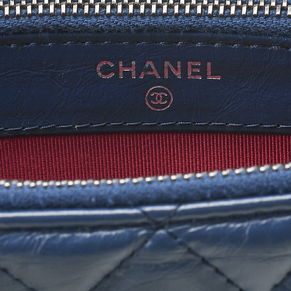 CHANEL Matelasse Chain Wallet Vintage Calf Gabriel de Chanel Navy x Black Gold x Silver-Tone Hardware, Pre-Owned