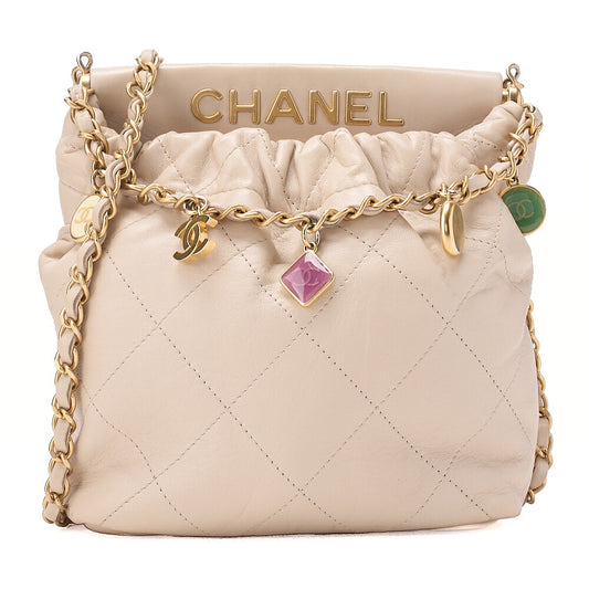 CHANEL Lambskin Matelasse with charm, drawstring style, chain shoulder, beige Gold-Tone Hardware, Pre-Owned