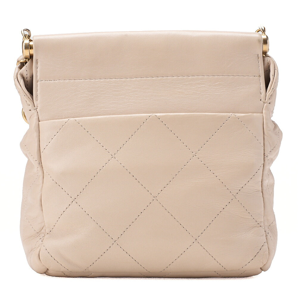 CHANEL Lambskin Matelasse with charm, drawstring style, chain shoulder, beige Gold-Tone Hardware, Pre-Owned