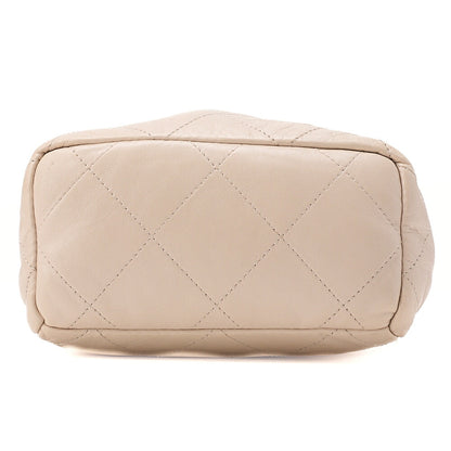 CHANEL Lambskin Matelasse with charm, drawstring style, chain shoulder, beige Gold-Tone Hardware, Pre-Owned