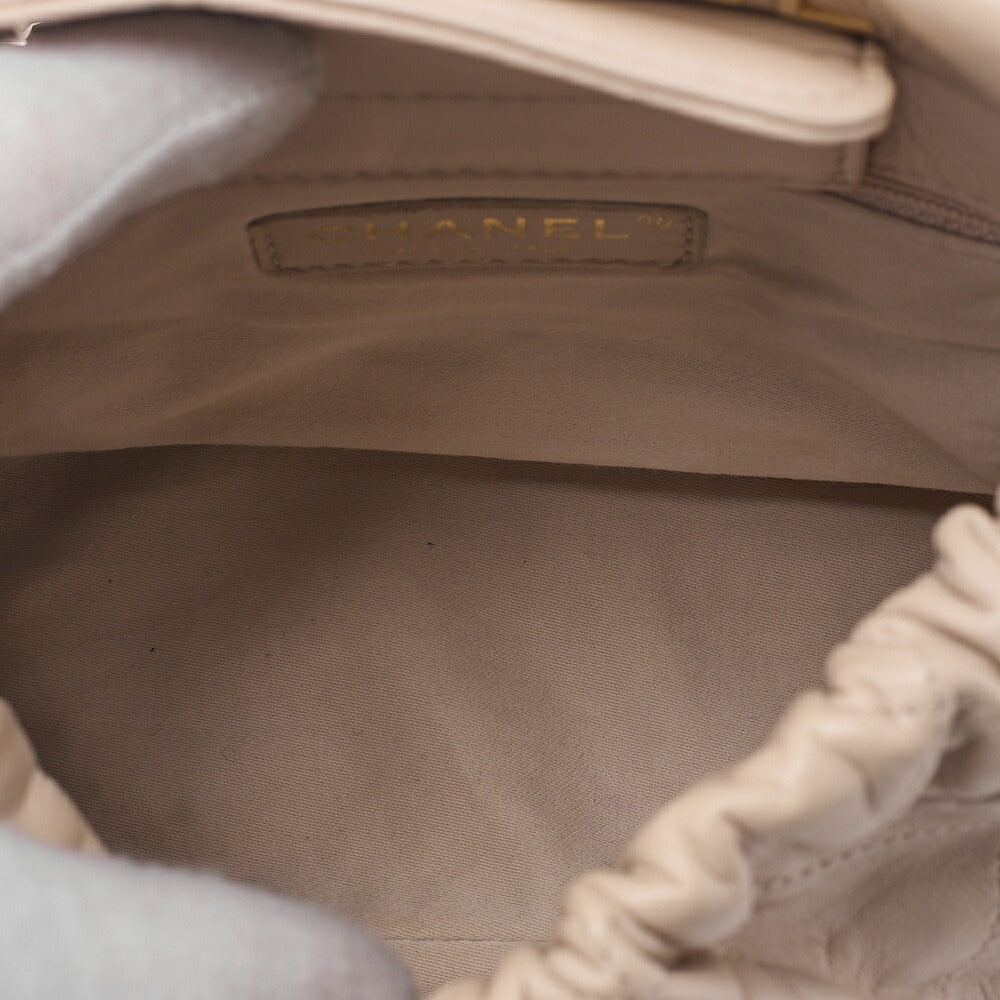 CHANEL Lambskin Matelasse with charm, drawstring style, chain shoulder, beige Gold-Tone Hardware, Pre-Owned