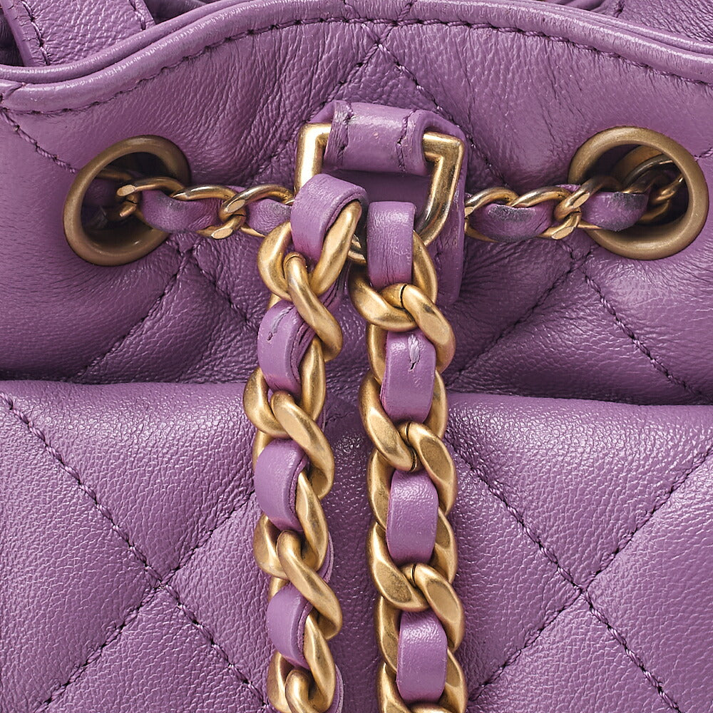 CHANEL Lambskin Matelasse Drawstring 2-Way Chain Backpack with Coco Charm Purple Gold-Tone Hardware, Pre-Owned