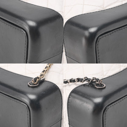 CHANEL Vintage Calf Gabrielle de Chanel Drawstring Chain Backpack White x Black Gold x Silver-Tone Hardware, Pre-Owned