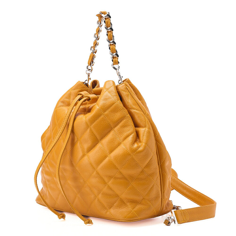 CHANEL Chanel Caviar Skin Drawstring Matelasse Chain Backpack with Plate Charm Yellow Silver-Tone Hardware, Pre-Owned