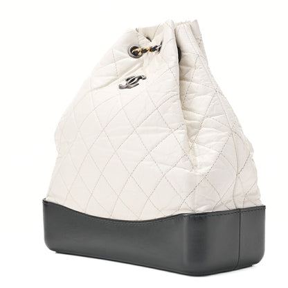 CHANEL Vintage Calf Gabrielle de Chanel Drawstring Chain Backpack White x Black Gold x Silver-Tone Hardware, Pre-Owned