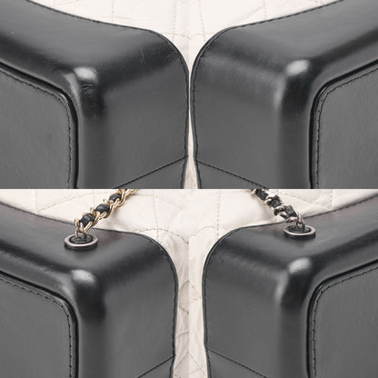 CHANEL Vintage Calf Gabrielle de Chanel Drawstring Chain Backpack White x Black Gold x Silver-Tone Hardware, Pre-Owned