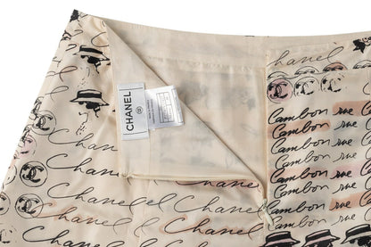 CHANEL Pleated Skirt, Coco Mark Logo, Silk, Ivory, Gold-Tone Hardware, Pre-Owned - Vintage La Charme