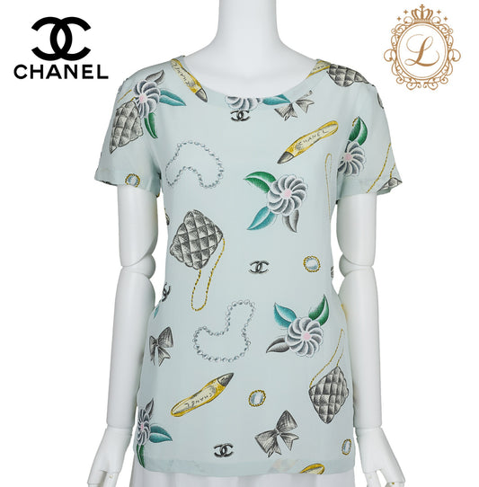 CHANEL T-Shirt Blouse Short Sleeve Ribbon Cut Sew Cotton Light Blue Gold-Tone Hardware Pre-Owned - Vintage La Charme